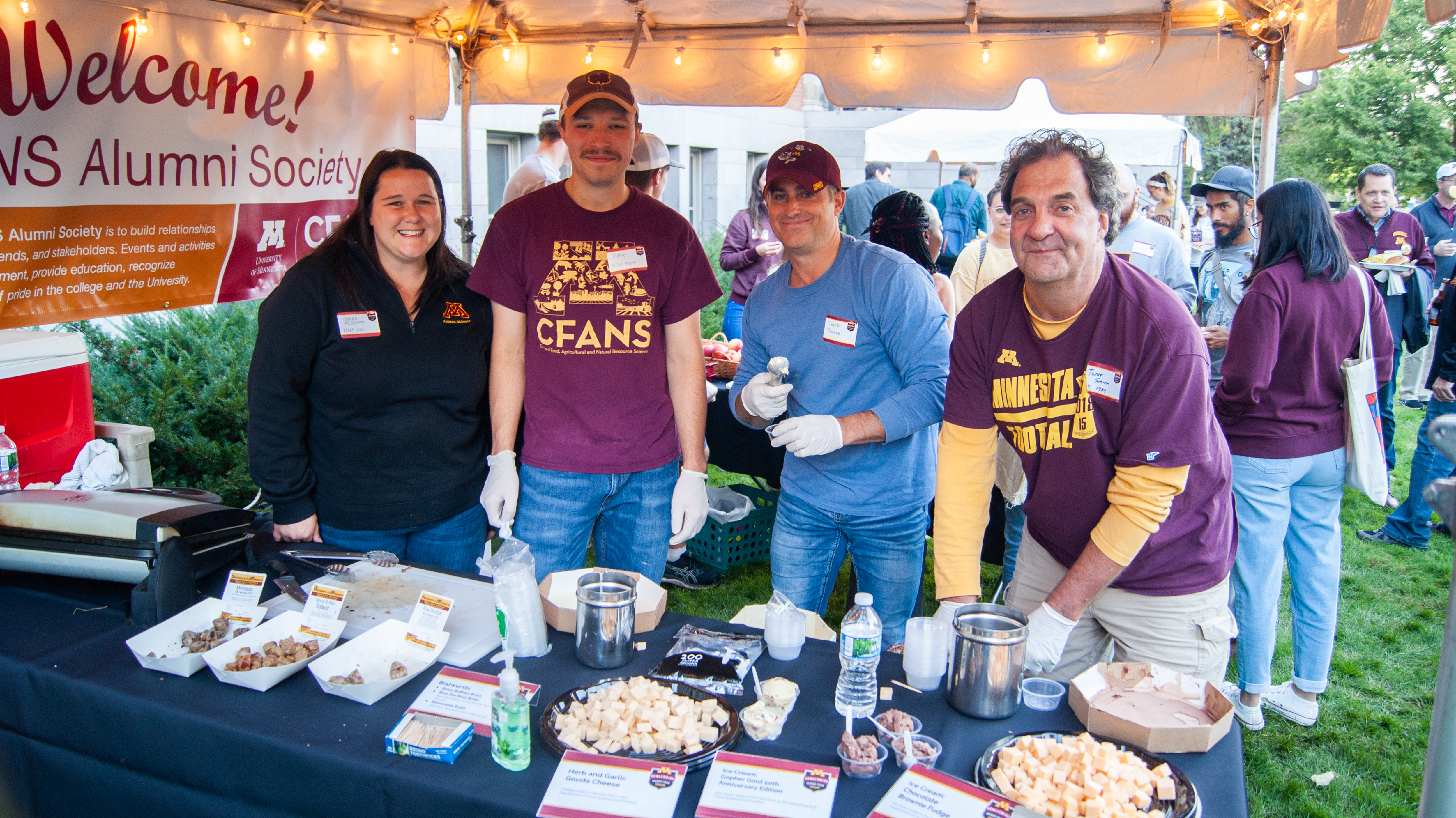 The CFANS sampler, with four volunteers serving cheese and ice cream