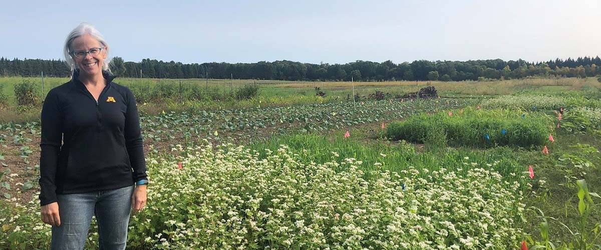 Horticultural science professor Julie Grossman near cover crops at Big River Farms.