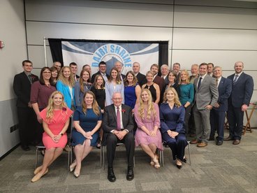 Les Hansen with current and former members of the Gopher Dairy Club