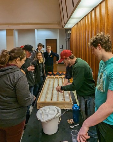 Students race minnows at the 2023 Winter Invitational.