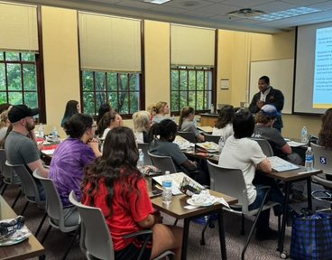 MPC students learn from a speaker in a classroom