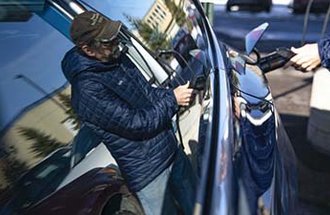 A person pumps gas. Photo credit: Alex Kormann, Star Tribune.