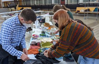 Students working at the Dare to Repair Fair.