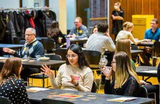 Participants in the CFANS Mentor Program talking at a networking event